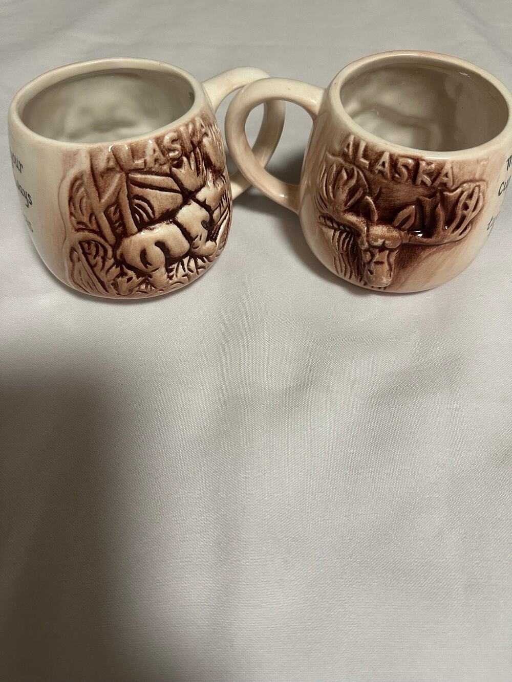 Vintage Alaska embossed ceramic coffee Mugs pair of 2